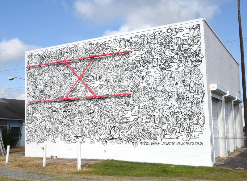 A ground-level shot of the completed mural.