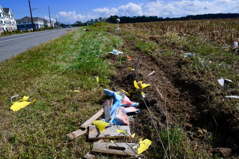 All that remains of the Pole Family is a debris field littered along Route 9 near Five Points just outside Lewes. For several years, unknown persons have been outfitting the Pole Family with season-appropriate attire. RON MACARTHUR PHOTOS