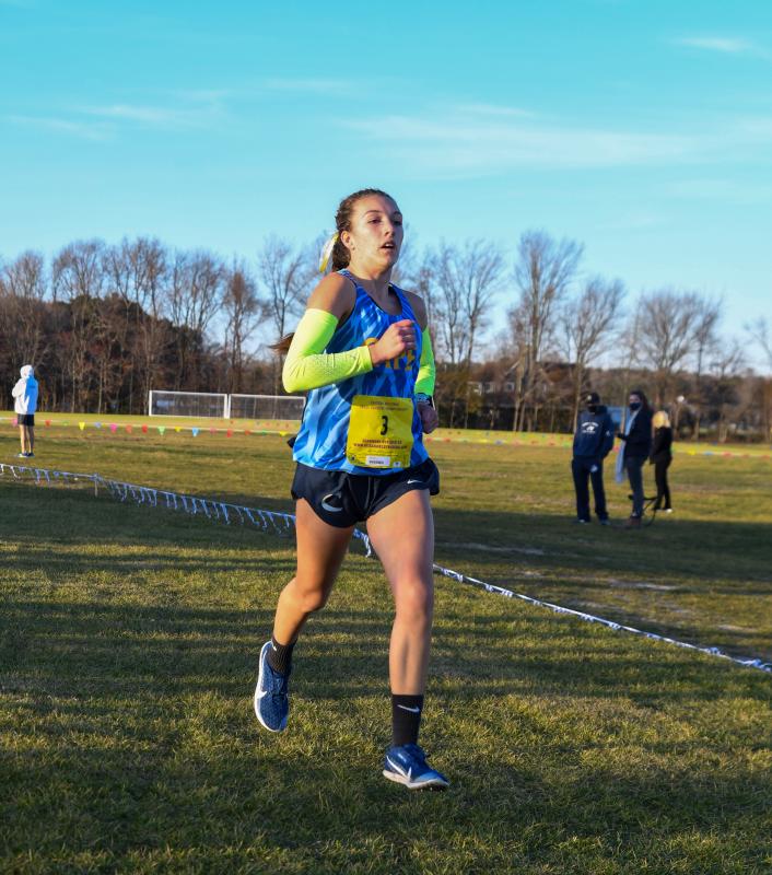 Katie Kuhlman takes second place with a personal-best time of 19:33.
