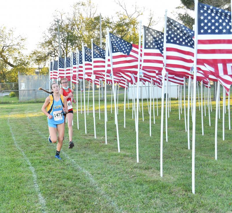 Katie Kuhlman of Cape and Alyssa Young of Smyrna set records on Cape’s course. DAVE FREDERICK PHOTOS