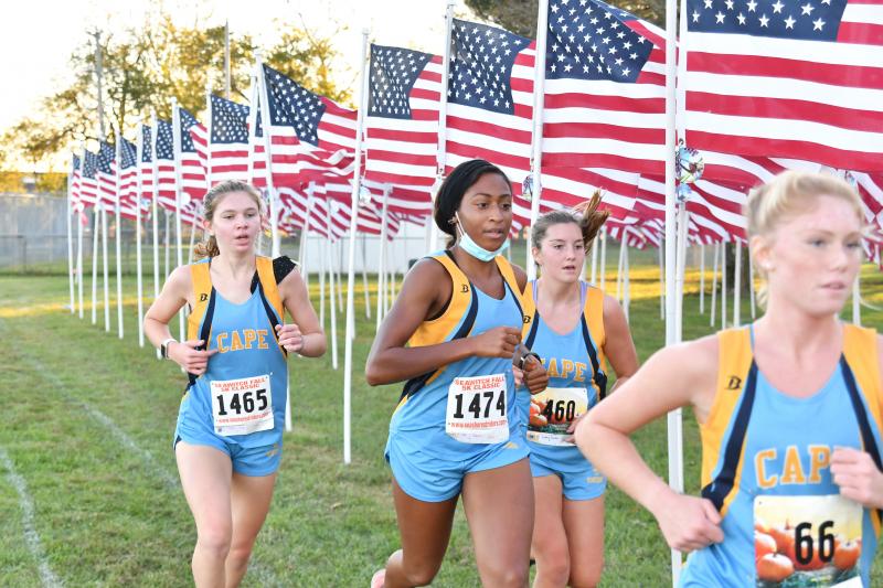 Running in order are Elizabeth Melson, Tia Jarvis, Lindsay Rambo, and Payton Evans.