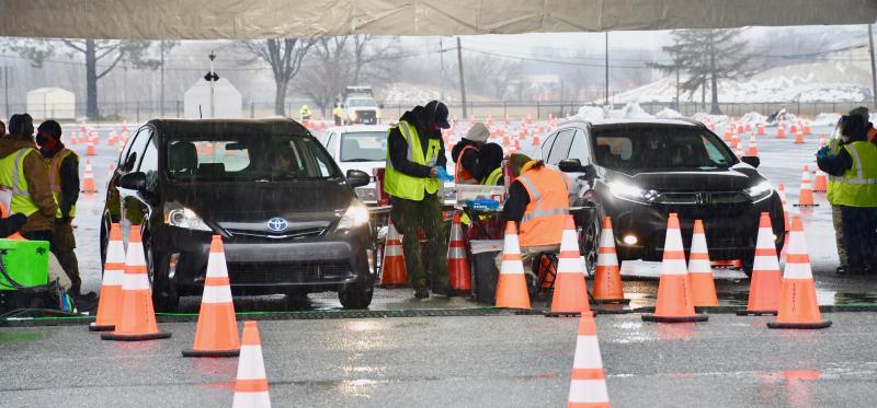 State and federal officials are planning to vaccinate nearly 19,000 people at a FEMA-coordinated event this week at Dover International Speedway. Additional reservations are now being taken. In spite of inclement weather, some of the 3,000 people expected Feb. 22 enter a tent to get vaccinated. RON MACARTHUR PHOTO