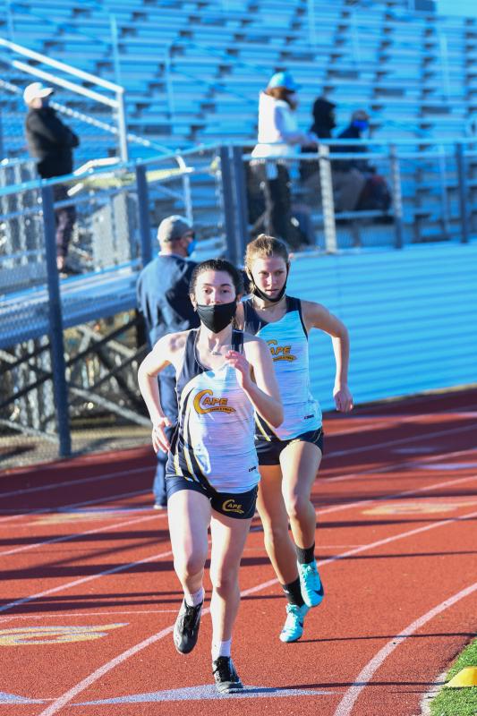 Alexa Dougherty and Taylor Johnson compete in the 800 meters.