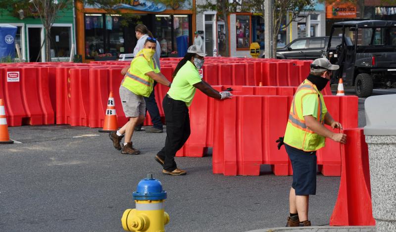 Rehoboth Beach public works crews put up barricades May 29, 2020, to allow more space for social distancing on Rehoboth Avenue and provide space for outdoor dining.