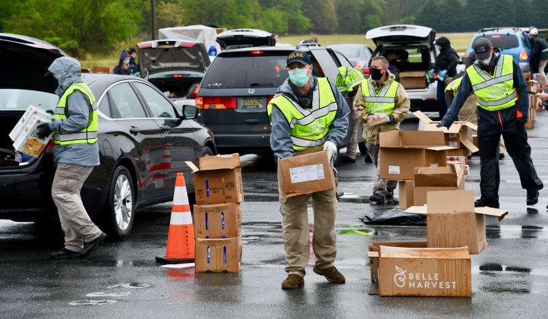 More than 150 volunteers staff a Delaware Food Bank mass distribution site May 18 at Sussex Central High School. It’s one of many distributions held throughout the state in 2020.