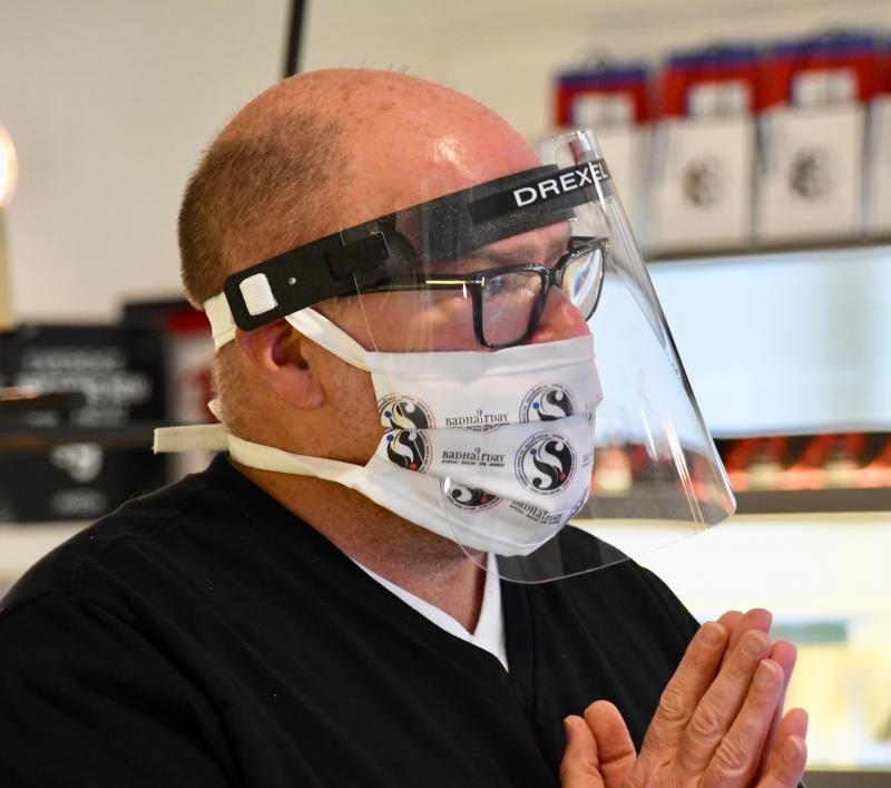 Like all other personal-service businesses, Bad Hair Day Salon owner Drexel Davison had to close his salon until June 8, 2020. Most businesses were limited to 30 percent occupancy even when they could reopen in June.