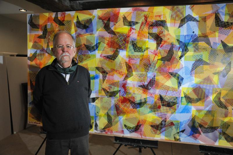 The Rev. Mark Harris recently completed a silk screen with 500,000 dots depicting the half-million people who have died of COVID-19. NICK ROTH PHOTOS