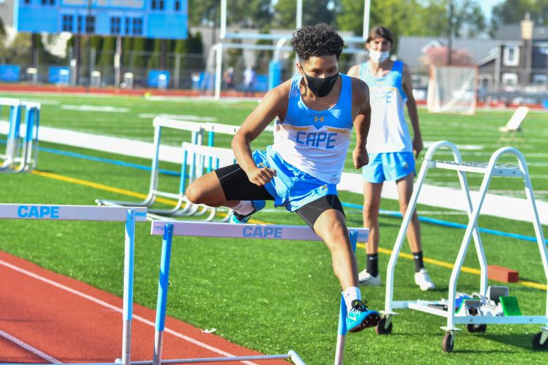 Bryan Garcia runs the 300-meter hurdles.