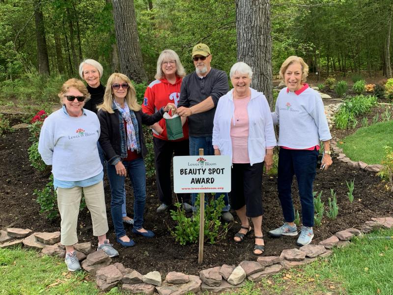 Recognizing Lewes in Bloom Beauty Spot’s first 2021 winner are (l-r) Lois Seshehay, Diane Stevens and Linda McDonald of Lewes in Bloom; homeowner Mary Ann Scarborough and Beauty Spot winner Robert Langshaw; and Lewes in Bloom members Ann Marie Rooney and Betty Hansot. SUBMITTED PHOTO