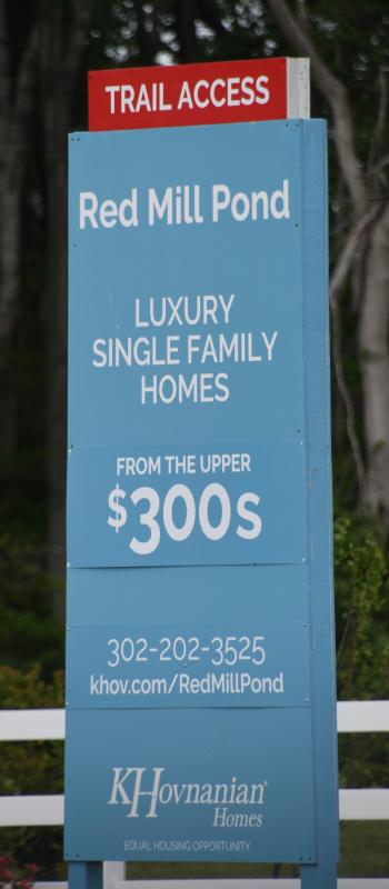 Prices for homes tend to decrease the further they are built away from the coast. Red Mill Pond is located off Route 9 west of Lewes.