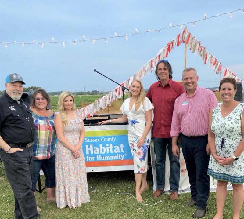 Sussex County Habitat for Humanity board members posed for a photo with Katey Jo Evans of the Frozen Farmer and Evans Farm. Shown are (l-r) Anthony DelFranco, Jeanine O’Donnell, Katey Jo Evans, Cheryl Crowe, President Ed Lewandowski, SCHFH Executive Director Kevin Gilmore and Bobbi Barends. SUBMITTED PHOTO