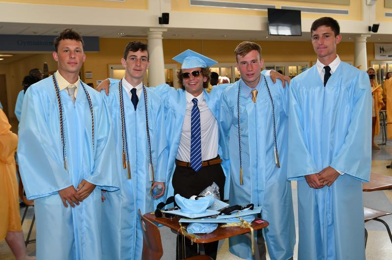 Awaiting the processional in the air-conditioned cafeteria are (l-r) Gabe Best, Jake Truitt, Will Kelleher, Landon Best and Brax Medd.
