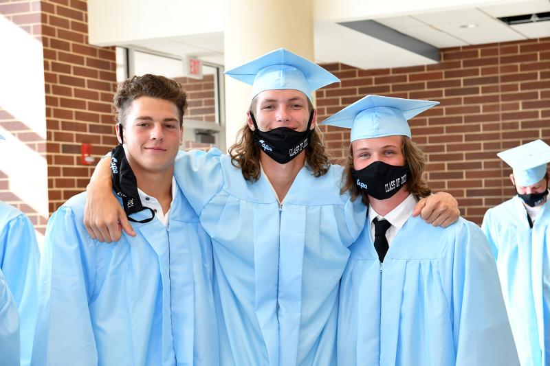 Friends (l-r) Nic Arnold, Drew Dennis and Adam Gorecki await the lineup.
