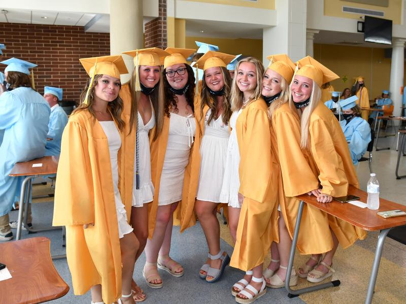 Showing off their smiles before the processional are (l-r) Jessica Osser-Velez, Krista Brittingham, Morgan Garyantes, Raegan Czyzia, Katherine Browne, Erin Frye and Emily Einsig.