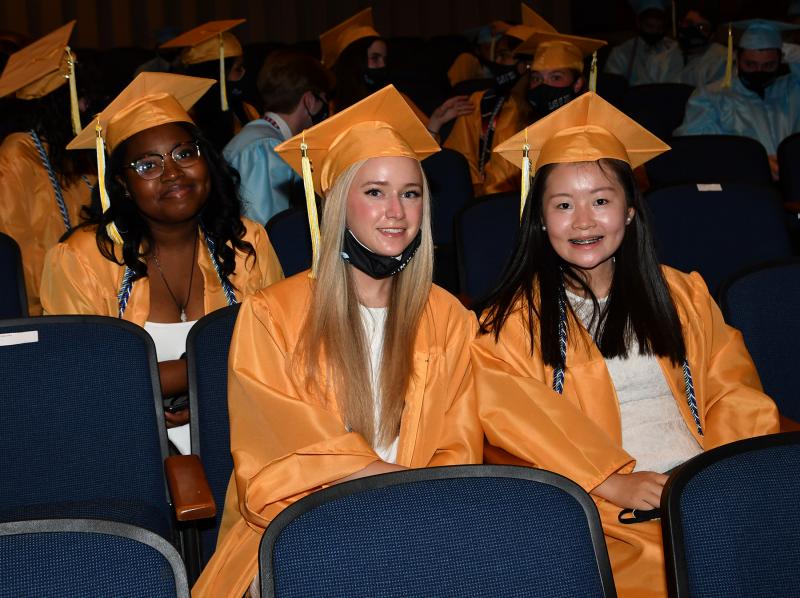 Staying cool in the auditorium are (l-r) Sincere McNeil, Haley Lorah and Xin Liu.