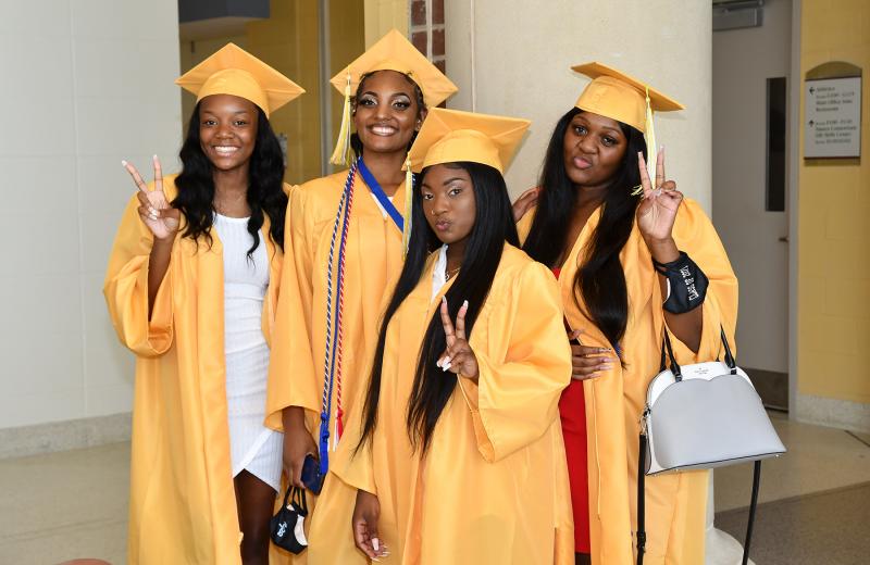 Waiting for the commencent are (l-r) Shayla Horsey, Kanasia Hopkins, Toni Frisby and Bria Wildy-DuPont.
