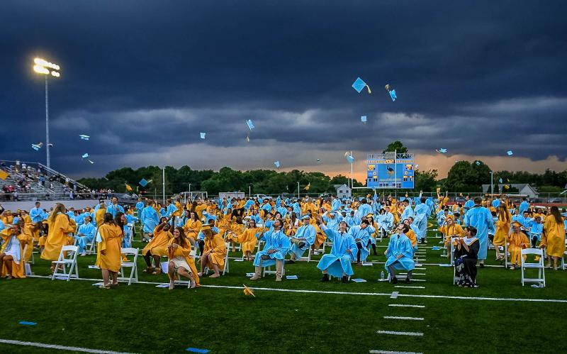 Dark rain clouds moved in but could not dampen the spirits of the Cape Henlopen High School commencement. DAN COOK PHOTOS