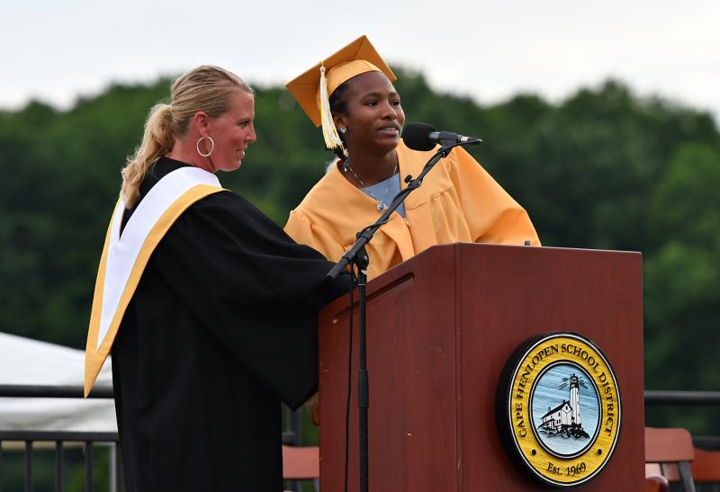 Class of 2021 advisor Susan Shea Calhoun gets a little help pronouncing the name of grad Abigail Ikechi-Konkwo.