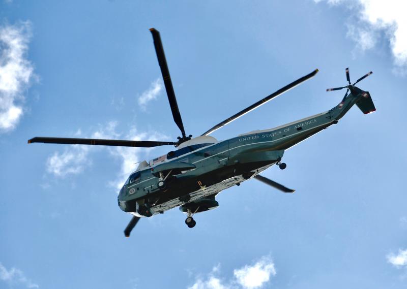 One of the three Marine Corps helicopters flies over Herring Point in Cape Henlopen State Park on its way to the Gordons Pond parking lot. RON MACARTHUR PHOTO