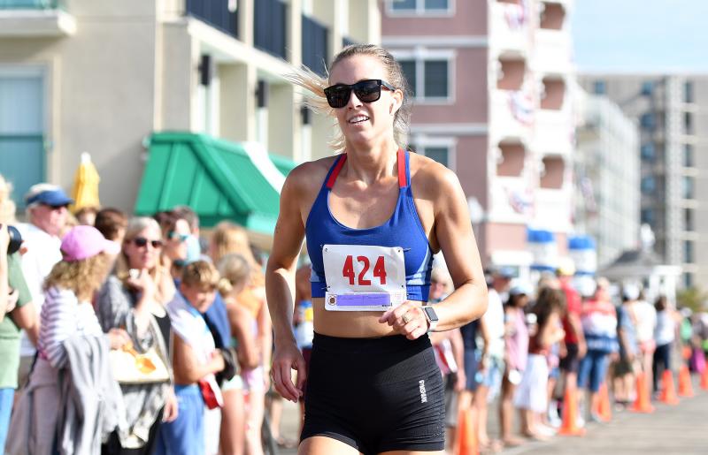 Sussex Tech grad Emily Ritter runs to the finish.
