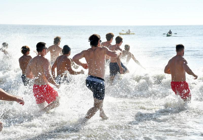 The first wave hits the surf.