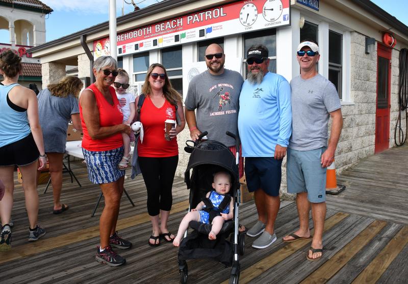 Family and friends of Dave Reynolds include (l-r) mother JoAnn Reynolds, Ashlee Reynolds, Mark Reynolds, Alexander Reynolds (in stroller), Kenny Broomfield and Matt Faircloth.