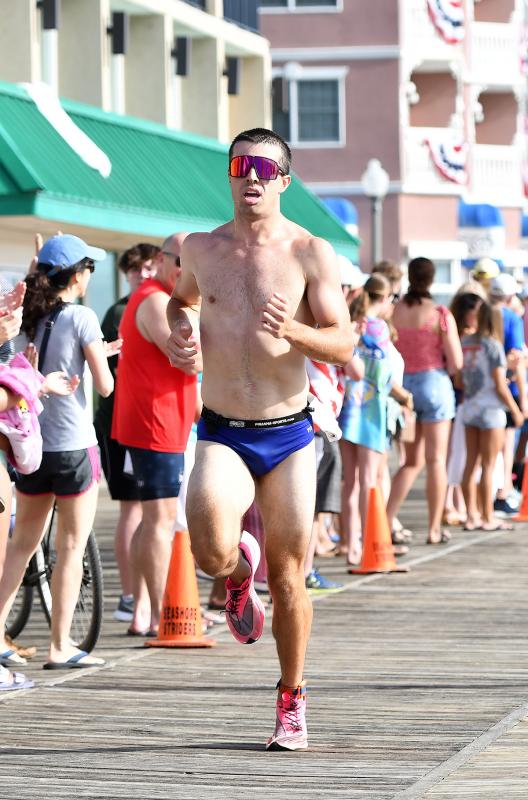 Sean Saxton of Dover takes first place with a time of 28:04.7.