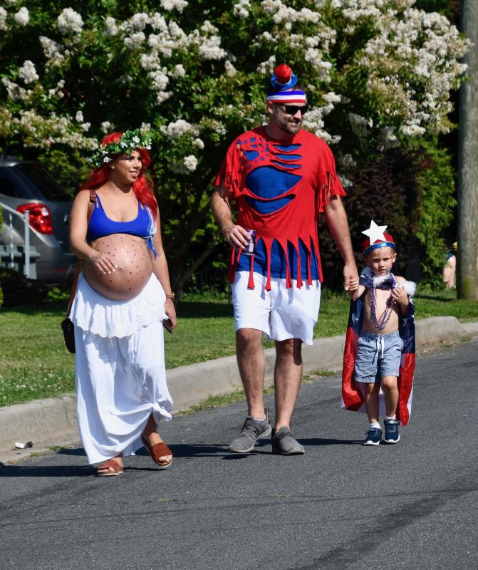 Viktoriya Hoenen keeps up the family tradition of marching in every Doo-Dah Parade even though she is nearly ready to have a baby. She’s walking with husband Jason and son Jrake.