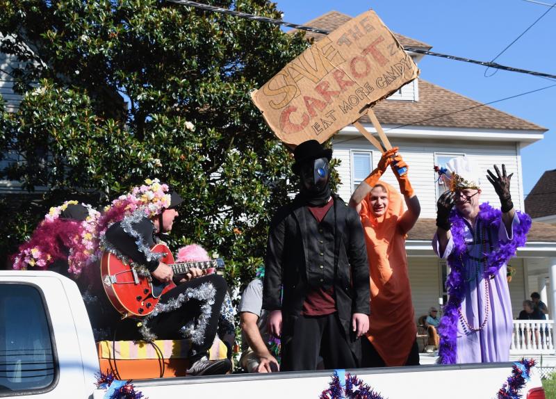 Who not? Carrots may be good for you, but candy is the name of the game on parade day.