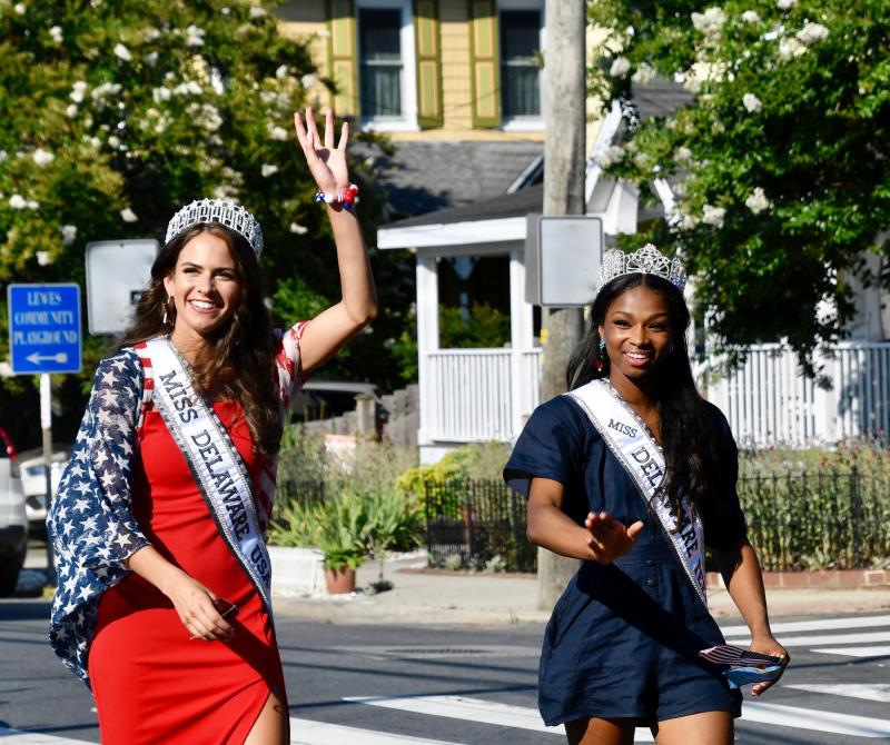 Miss Delaware USA Drew Sanclemente of Odessa, left, and Miss Delaware Teen Sky Knox of Newark wave to the large Doo-Dah Parade crowd.