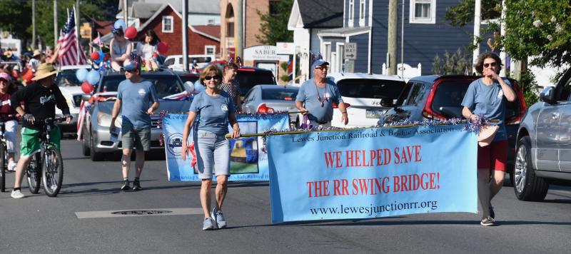 Members of the Lewes Junction Railroad and Bridge Association proclaim their latest achievement - saving the historic Lewes-Rehoboth swing bridge.