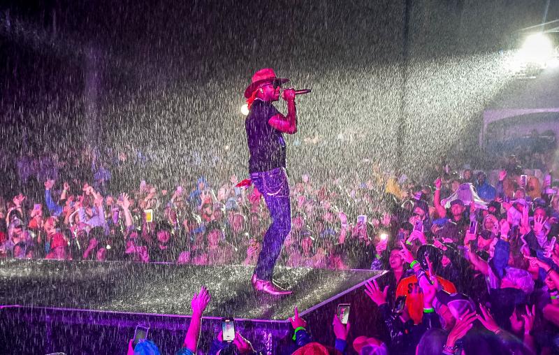 Rain could not dampen the spirits of the fans as Jimmie Allen performed at the inaugural Bettie James Fest at Hudson Fields. DAN COOK PHOTOS