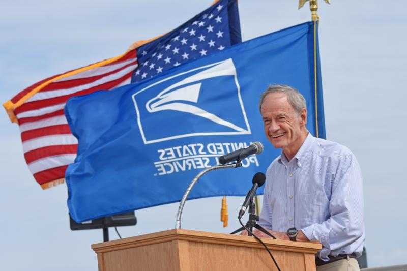Sen. Tom Carper jokes that he wants his tombstone to read “Return to Sender.”