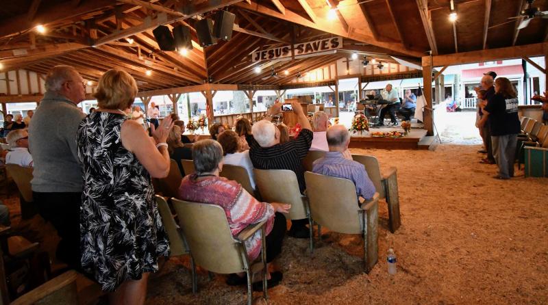 Each night, Carey’s Camp tabernacle hosts services of preaching and music.