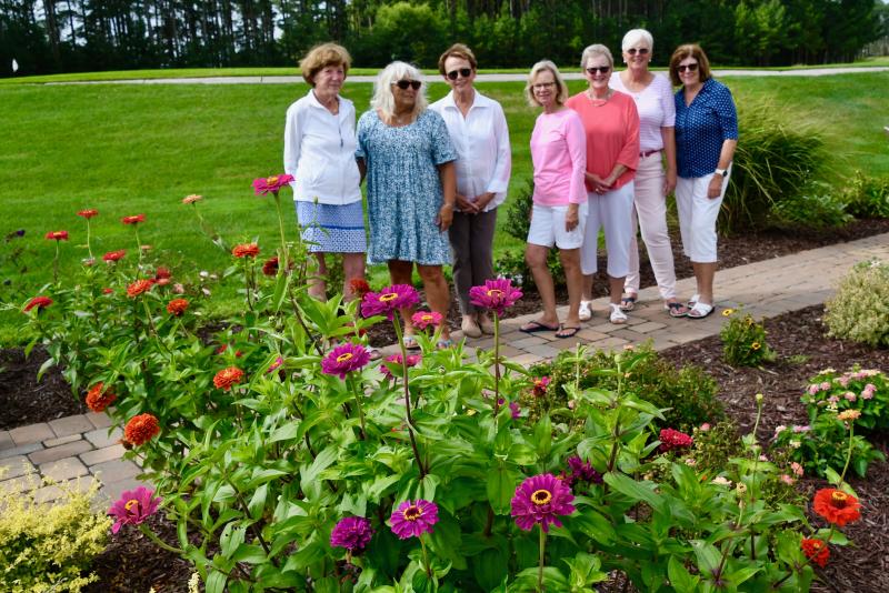 The Peninsula community ladies who serve on the garden committee are (l-r) Anne Berhardt, Kimberly Plum, Fran Jarvis, Robin Richman, Martha Wieber, Kathy Lucente and Kathy Anderson. Missing from the photo are Elizabeth Howard and Val Ellenberger.