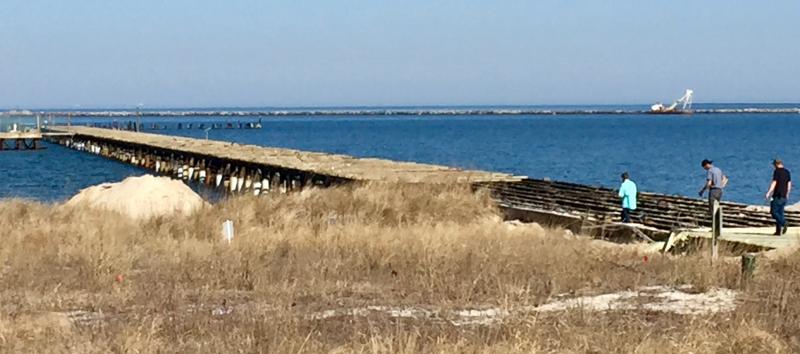 The fishing pier at Cape Henlopen State Park, once part of mine-deploying operations at Fort Miles, had seriously deteriorated before it was rejuvenated to its present state several years ago. Now more work is needed, and master planning is underway for a replacement pier. This photo shows the condition of the pier many years ago before it was rehabilitated. DENNIS FORNEY PHOTO