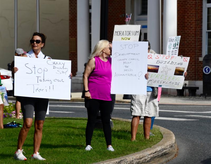 Residents line both sides of The Circle as they voice their concerns during a Sept. 21 protest.