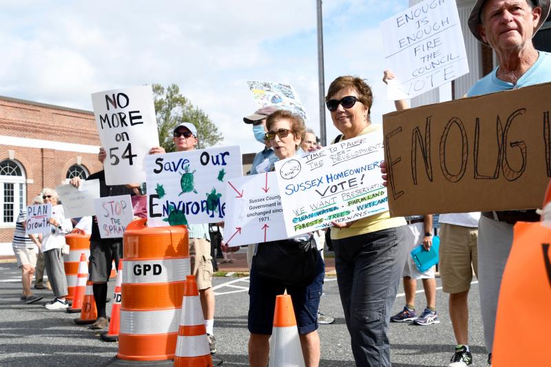 Protesters voice their concerns using the words on their signs. Several held signs stating “No More On 54,” referring to growth along the Route 54 corridor in southeastern Sussex County.