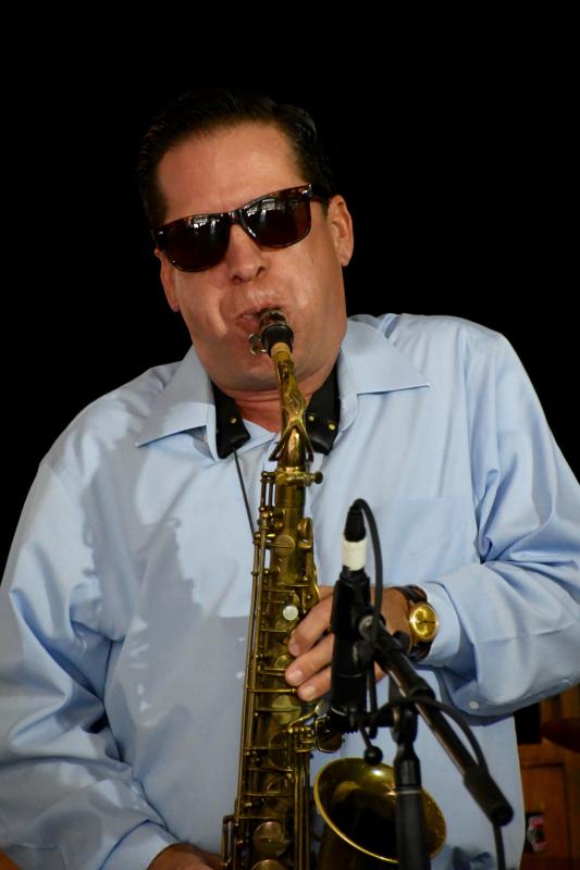 Saxophonist Vince Lardear is a member of the Hammond B3 Organ Trio, a band performing in the True Blue Jazz Festival.