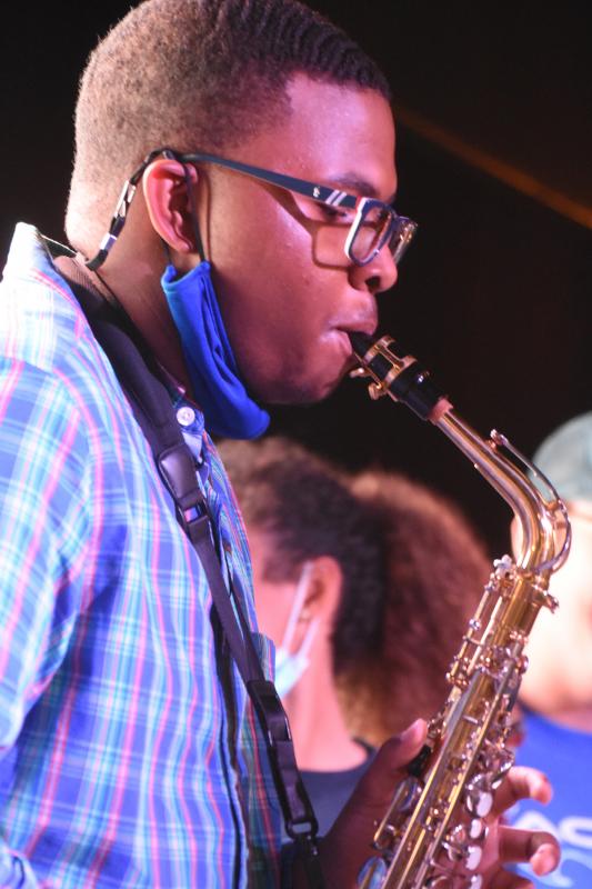 Jordan Davis takes his turn on center stage playing a sax solo.