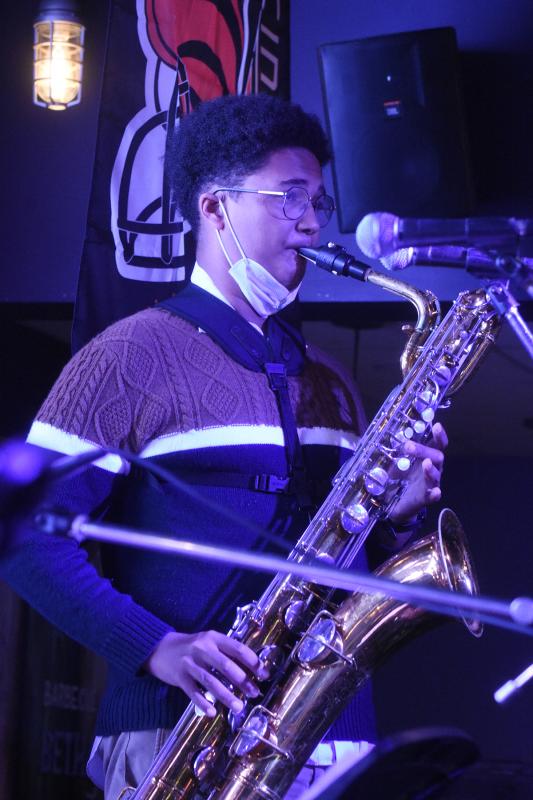 Bryce Fulgham jams with the big sax.