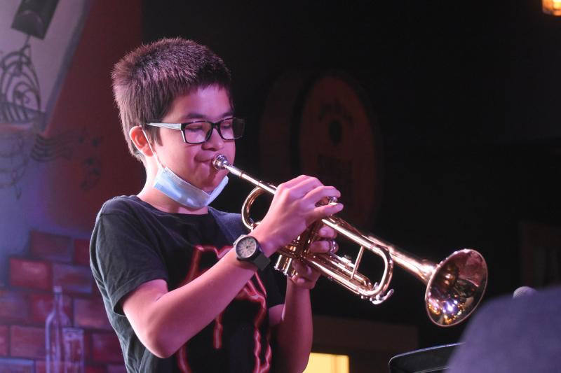 Jack Thomas plays trumpet with the Thomas Trio.