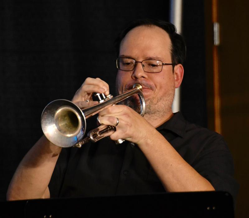 Mike Gleason, playing lead trumpet for The Spartan Alumni Jazz Band, takes center stage performing a solo on the song “MacArthur Park.” The band performed in the Oct. 16 True Blue Jazz Big Band Marathon.