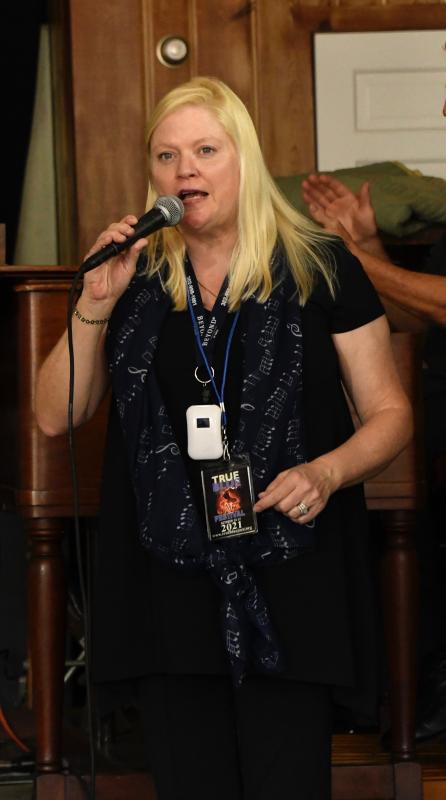Peggy Raley-Ward introduces a band during the True Blue Jazz Big Band Marathon Oct. 16 in Rehoboth Beach. She and her husband Eddie Sherman (Sherman Ward) are performers and founders of the festival.