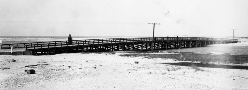 The first bridge over Indian River Inlet – built to complete the first ocean highway between Rehoboth Beach and Bethany Beach – was this wooden structure finished in 1933. DELAWARE PUBLIC ARCHIVES PHOTO