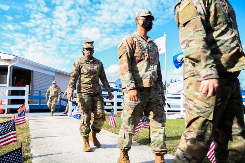 Army Reservists arrive at the American Legion Post 17 pavilion Nov. 6. KAIT MOORE PHOTO