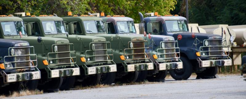 Vehicles at the Army Reserve 946th Transportation Company in Lewes are ready for deployment to Fort McCoy, Wis.