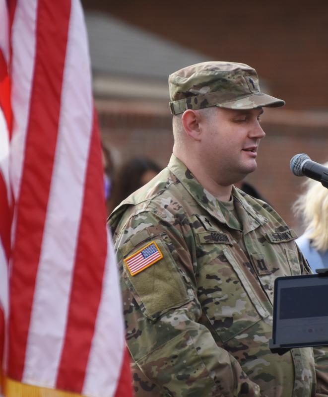Chaplain Capt. David N. Goodin offers the invocation. NICK ROTH PHOTO