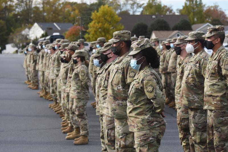 Members of the 946th Transportation Company stand in formation during the deployment ceremony Nov. 7 at St. Jude the Apostle Catholic Church in Lewes. NICK ROTH PHOTO