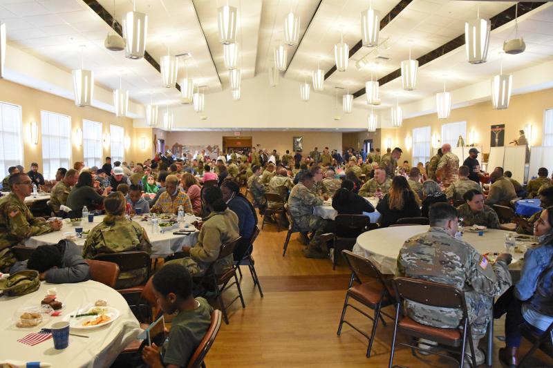 Soldiers enjoy one last meal with their families before heading to Wisconsin. NICK ROTH PHOTO